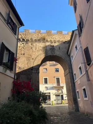 an archway in a building next to a building at Vatican Rooftop Studio - NEW OPENING in Rome