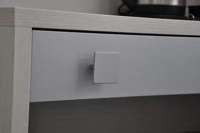 a close up of a wooden drawer with a switch at Imperial Relais in Rome