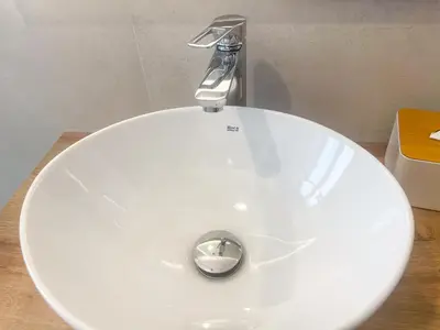 a white towel rack in a room at RM555 Elegant apartment in Rome