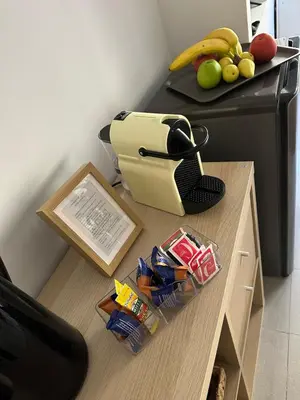 a kitchen counter with a table with food on it at Appia Suite in Rome