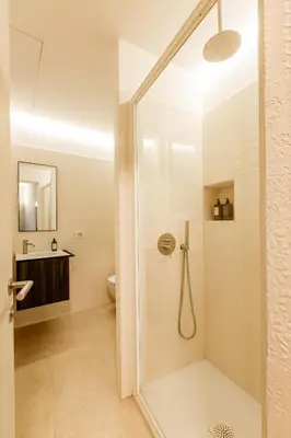 a bathroom with a shower and a toilet at Interno2 - Cozy flat near Vatican Museums in Rome