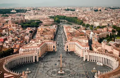an aerial view of a city with a large building at Rome Centre - Spacious Apartment - AC - Wi-Fi - Metro in Rome