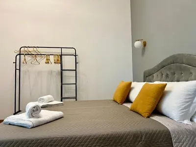 a bedroom with a bed with towels on it at Suite Vaticano in Rome