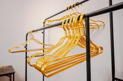 a metal rack with yellow handles on it at Suite Vaticano in Rome