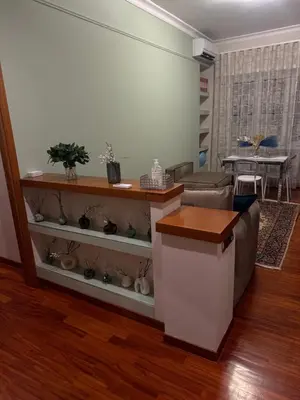 a living room with a couch and a table at San Pietro Street 9 in Rome