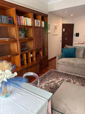 a living room with a couch and a table at San Pietro Street 9 in Rome