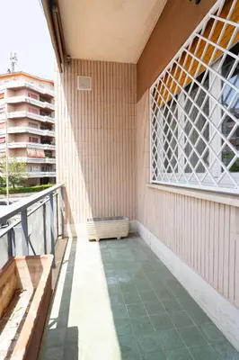 a balcony of a building with a window at Home d'élite Gregory in Rome