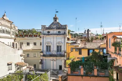 an old building in the middle of a city at Rarity Suites in Rome