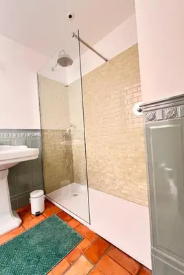 a shower with a glass door in a bathroom at Historic Fresco Suite Rome Colosseum Boutique Stay in Rome