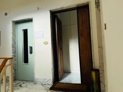 an open door in a room with a hallway at San Pietro in Vaticano Terrazza Giovy in Rome
