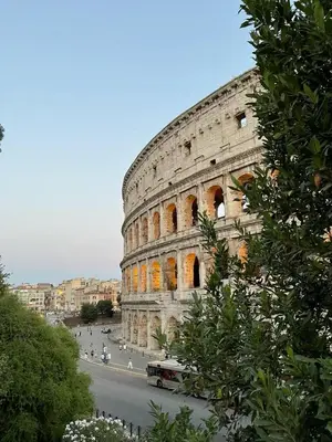 a bus is parked in front of the coliseum at Sunny apartment in central Rome in Rome