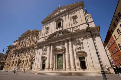 a large stone building with a clock tower at Navona Maison in Rome