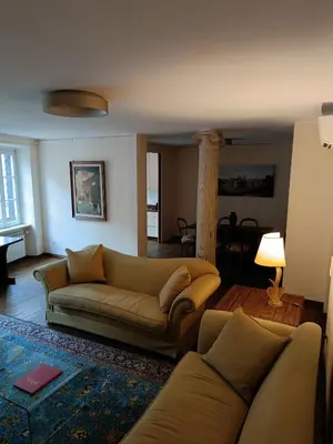 a living room with a couch and a table at Via del Corso Apartment in Rome