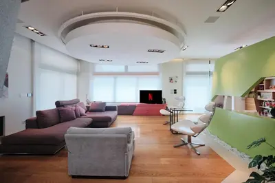 a living room with a couch and a table at NEW 3BDR Lab4House a Villa Borghese Roma Parioli in Rome