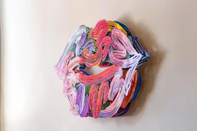 a multicolored coil of string on a white surface at Flaminia Luxury Hideaway in Rome