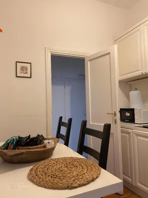 a kitchen with a table with a bowl on it at Casa Vannozza De' Cattanei in Rome
