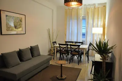 a living room with a couch and a table at Big Home In Vatican in Rome