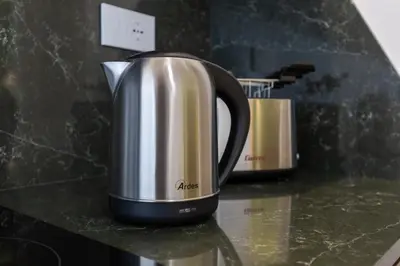 a coffeemaker sitting on top of a counter at Chigi Home in Rome