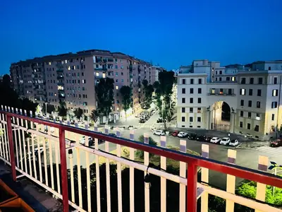 a view of a city with cars parked in a parking lot at Sky Global Suites in Rome