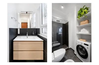 a bathroom with a sink and a washing machine at Leonina Art Loft in Rome