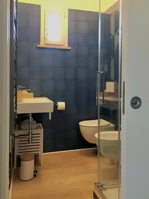 a bathroom with a sink and a toilet at Borgo Capua in Rome