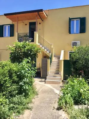 a house with stairs and a stair railing at Borgo Capua in Rome