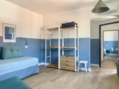 a bedroom with a bunk bed and a room at Borgo Capua in Rome