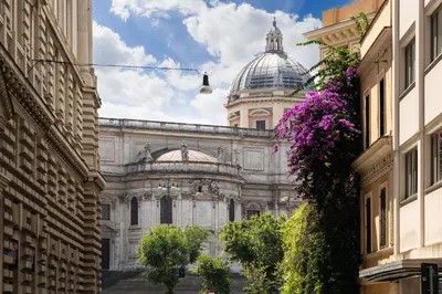 a view of a building with a dome at Maria Luxury Apartment with City View Terrace in Rome