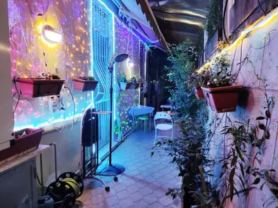 a room with lights on the side of a building at Holiday Jeans Apartment in Rome