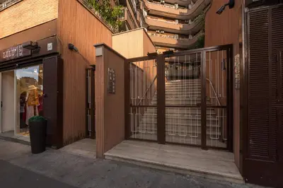 an entrance to a building with an open gate at Tiburtina Station Rooftop Angel Joy with Private Terrace - Superattico con Terrazzo privato in Rome