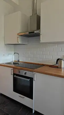 a kitchen with a sink and a stove at LIFEI House in Rome