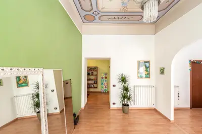 a room with a ceiling and two potted plants at The Bright Marajà Roma Centro Luxury Boutique Retreat in Rome
