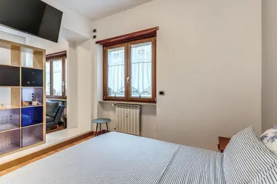 a bedroom with a bed and a window at VaticanRhome I in Rome