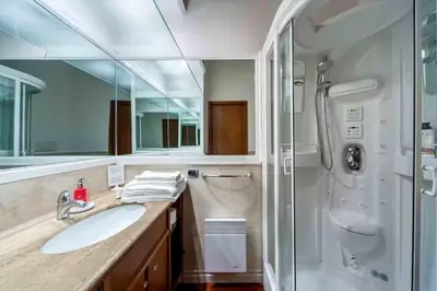 a bathroom with a sink and a shower at Romantic in Rome