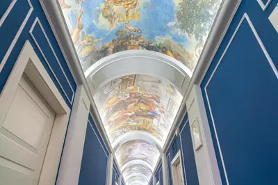 a building with a painting on the ceiling at Corso Boutique Luxury Rooms in Rome