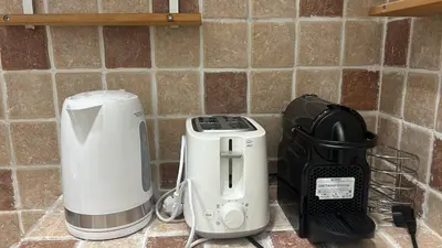 a kitchen counter with a toaster and a blender at Colosseo Promenade in Rome
