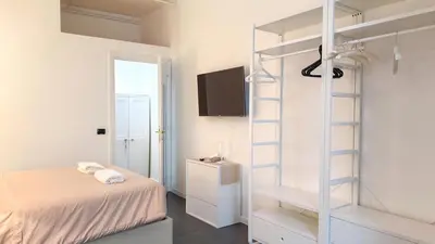 a bedroom with a bunk bed and a ladder at Beautiful apartment within walking distance of the Vatican in Rome