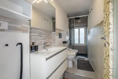 a bathroom with a sink and a toilet at ht movie flat bilo in Rome