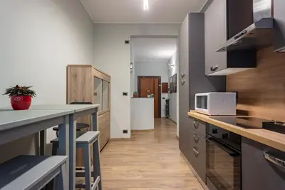 a kitchen with a counter top and a microwave at Aurelia Garden Suite in Rome