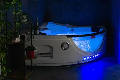 a white bath tub in a blue room at Aurelia Garden Suite in Rome