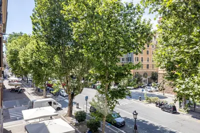an overhead view of a city street with trees at Vatican Gallery Apartment in Rome