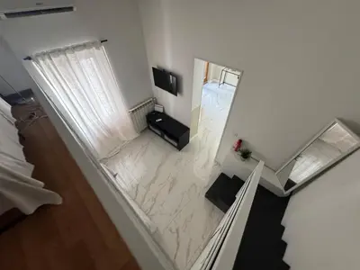 an overhead view of a living room with a marble floor at Vacanze Romane in Rome