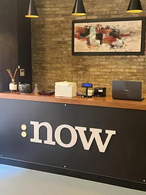 a macbook store counter with a laptop on it at Now Apartments, ApartHotel in the heart of Rome in Rome
