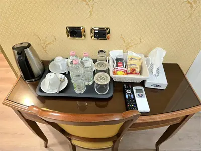 a hospital room with a bed and a table at Hotel Amadeus in Rome