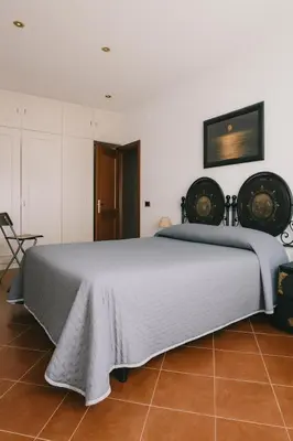 a bedroom with a large bed in a room at La Casa del Viaggiatore in Rome