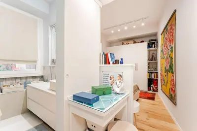 a home office with a glass desk in a room at Refined two-bedrooms Roman Residence in Rome
