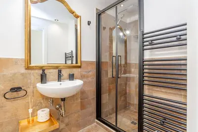 a bathroom with a sink and a shower at Easybnb - Daisy in Rome