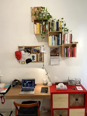 a desk with a laptop computer on top of it at Small and very small house in Rome