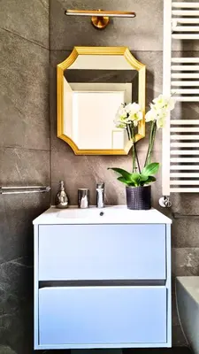 a bathroom with a white sink and a mirror at Beautiful Apartment San Pietro in Rome