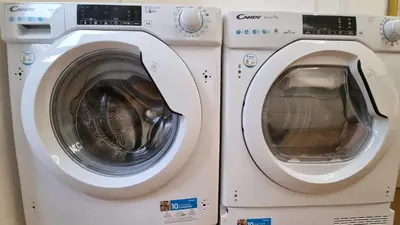 two washing machines are next to each other at Beautiful Apartment San Pietro in Rome